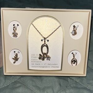 A New Day Gold Necklace with Charms